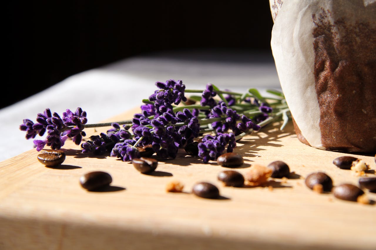 services-03 Aromatic lavender with coffee beans on a wooden board, creating a relaxing ambiance.